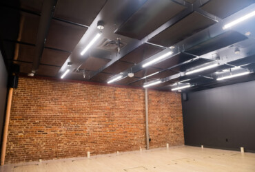 Hot Yoga Studio with Modern Black Yoga Panels